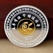 深圳传奇服装公司银镶金纪念银镶金纪念章订制